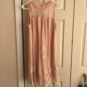 Sleeveless high neck lace dress